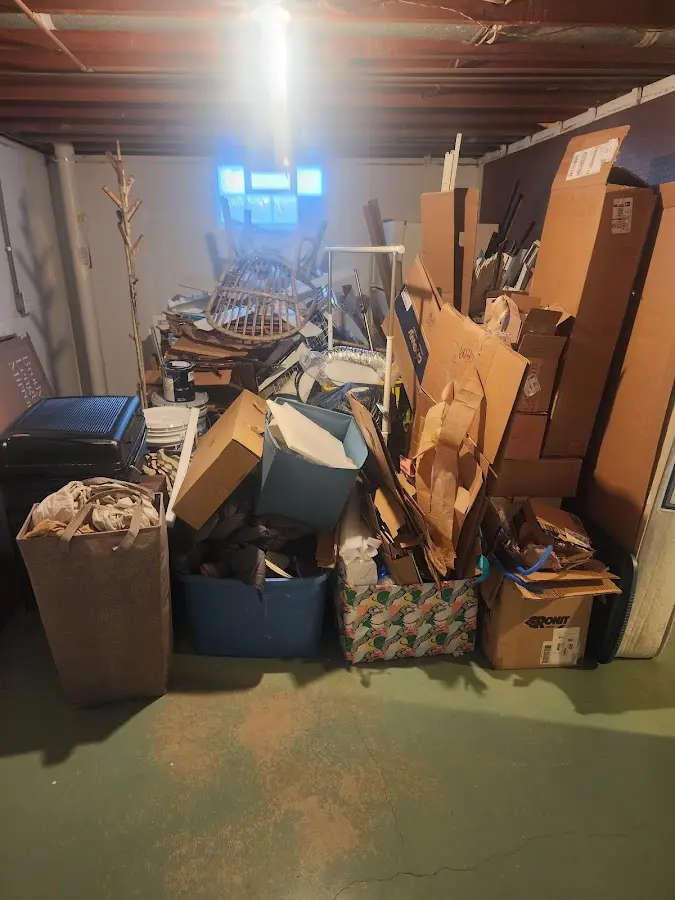 Roll-off dumpster container at job site for 4 Yard Dumpster Rental in Lanett